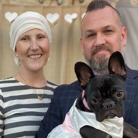 Joel and Rebekah Hughes with their dog