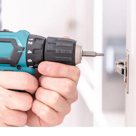 Furniture assembly with a power drill